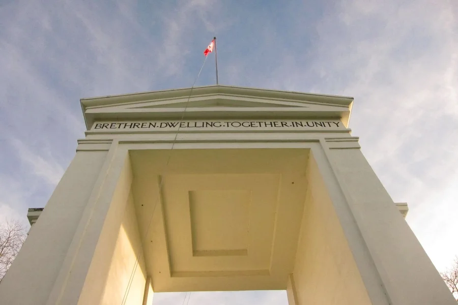 Peace Arch Border Crossing Surrey Blaine Peace Arch international border crossing monument showing highway lanes and green park lawn